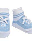 Little boy socks in light blue with shoelaces in a gift box