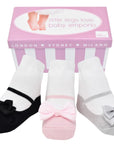 A box of Mary Jane shoe-look baby girl socks in pink, black and silver