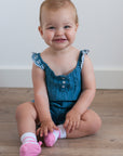 Baby girl wears pink ballet socks by Baby Emporio size 0-12 months with anti-slip soles