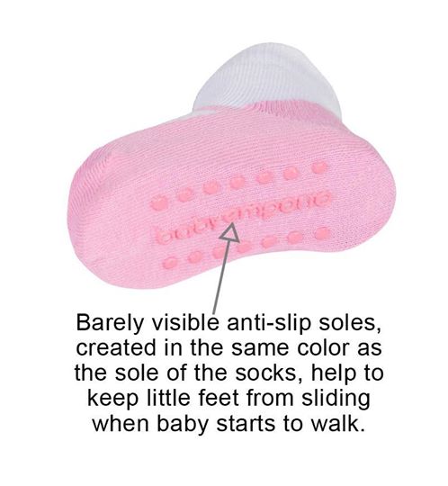 Anti-slip soles on pink baby girl socks by Baby Emporio size 12-24 months