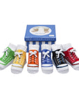 Baby gift box with sneaker socks that look like shoes with faux shoe laces and anti-slip soles