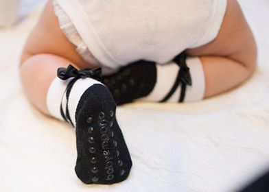 Baby girl wearing black ballerina socks size 0-12 months by Baby Emporio