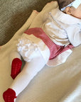 Infant girl wears Baby Emporio white footed leggings tights with red shoe look size 0-6 months