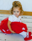 Christmas or Valentine's Day dress for toddler girl with white tights that feature feet in shoe look design 12-24 months