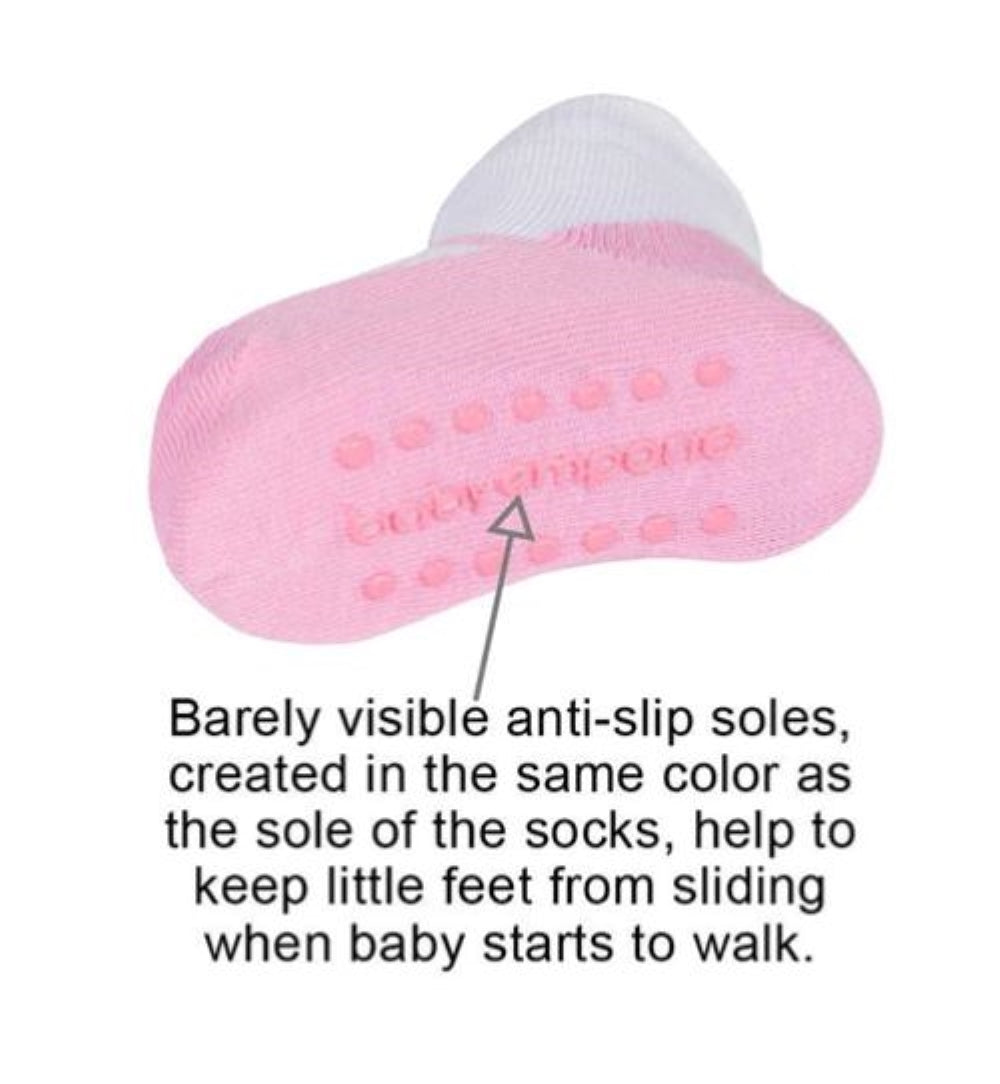 Anti-slip soles on pink baby girl socks with shoe design look by Baby Emporio