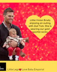 Tom Brady with baby daughter wearing Baby Emporio gold metallic sparkle socks with organza ruffle